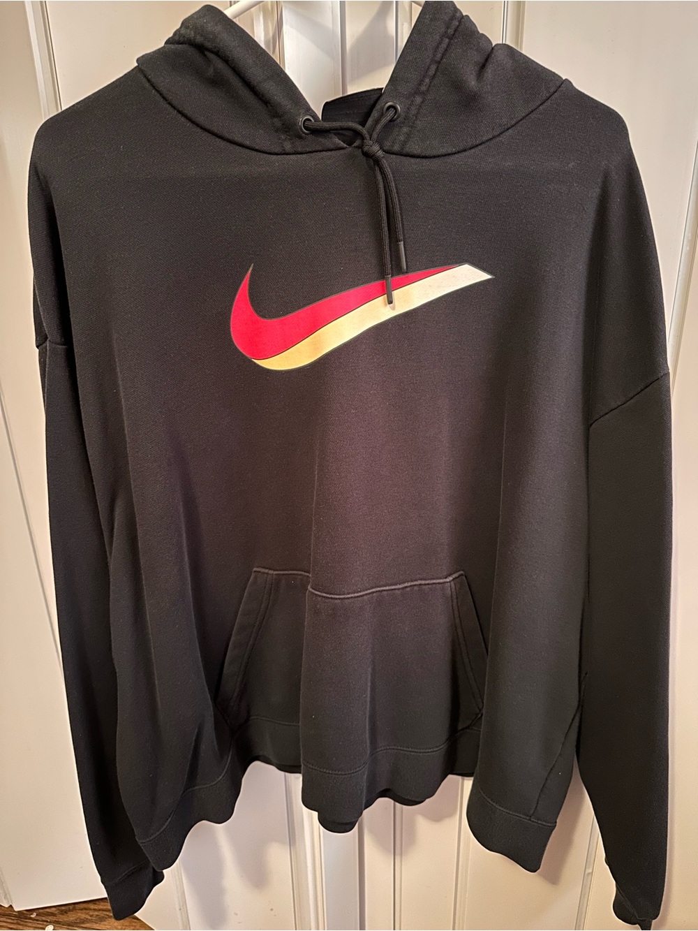 Nike Black Hoodie with Red and Gold Gradient Swoosh